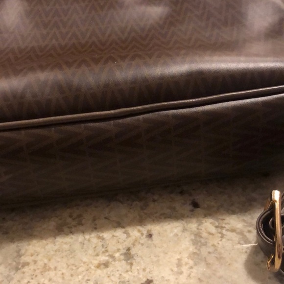 Mario Valentino Crossbody Bag
Mario Valentino
Size: 11 × 8 × 3.5 - Picture 7 of 11